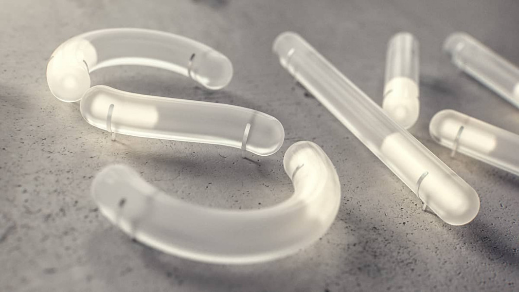 3D light tubes formed to letters on concrete